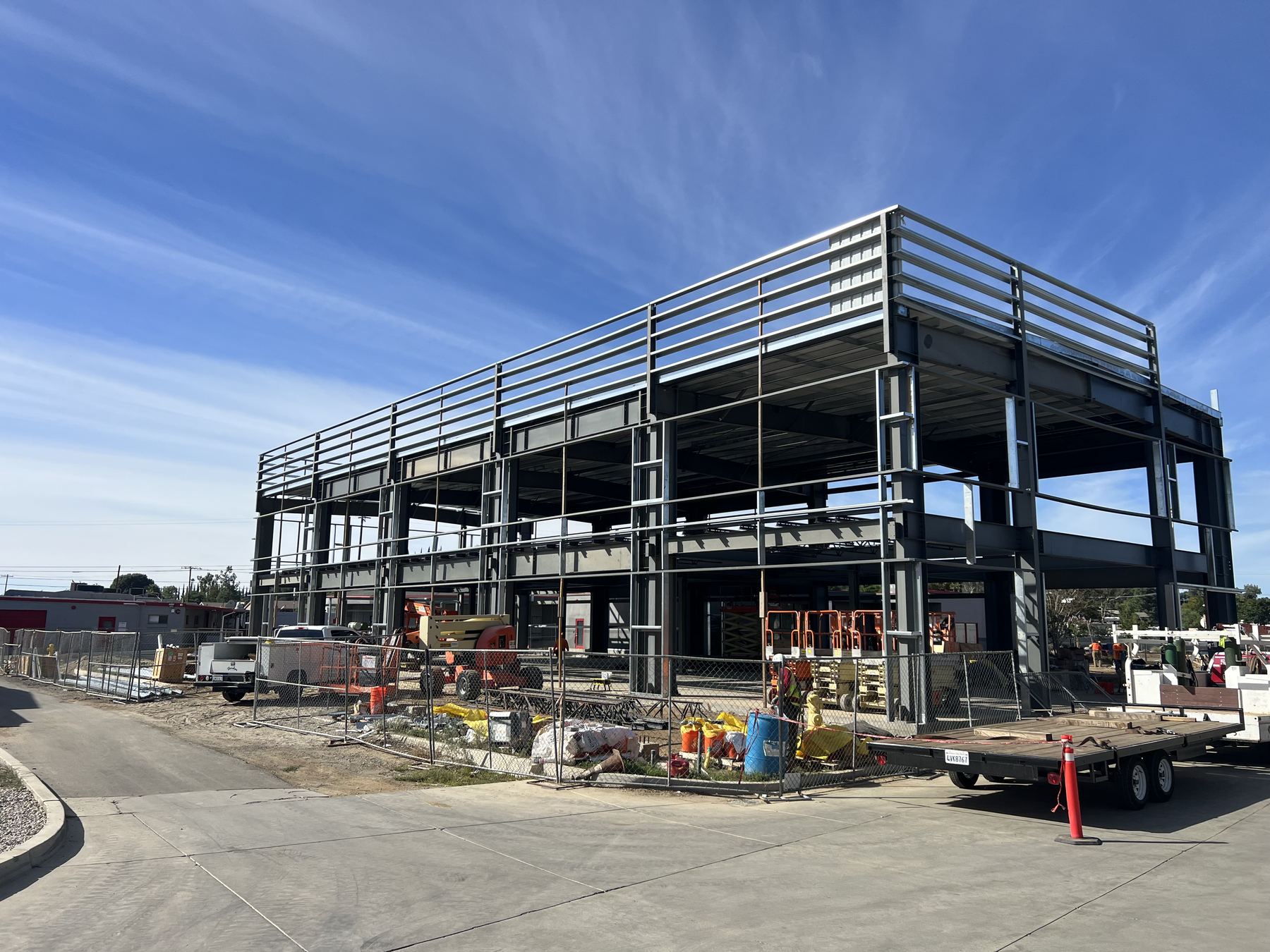 Structural steel framing under a clear sky, Southern California
